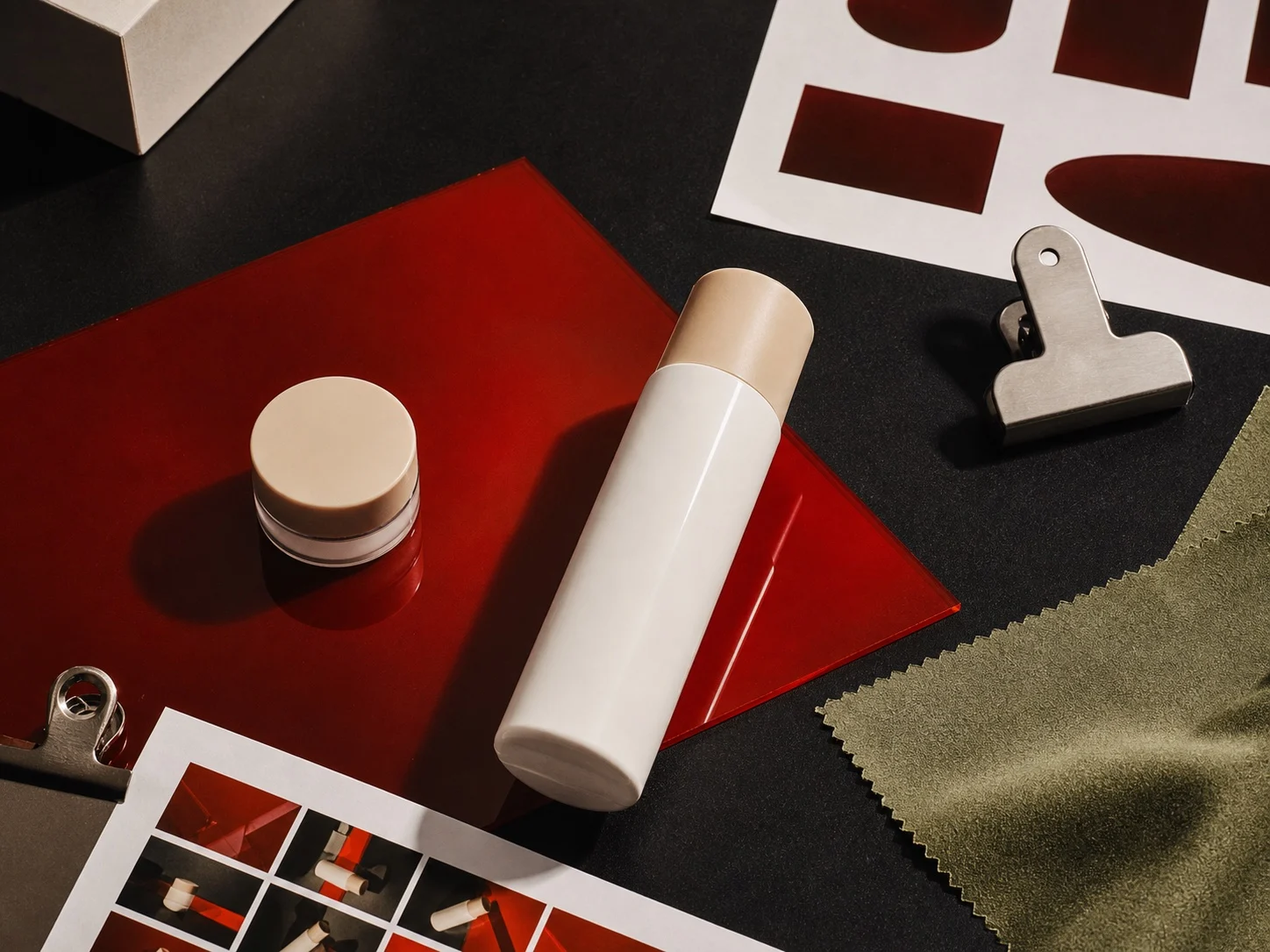 Cosmetics arranged in the same warm campaign palette